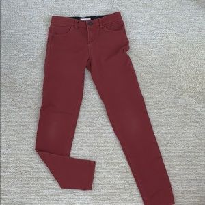 orange-red jean pants